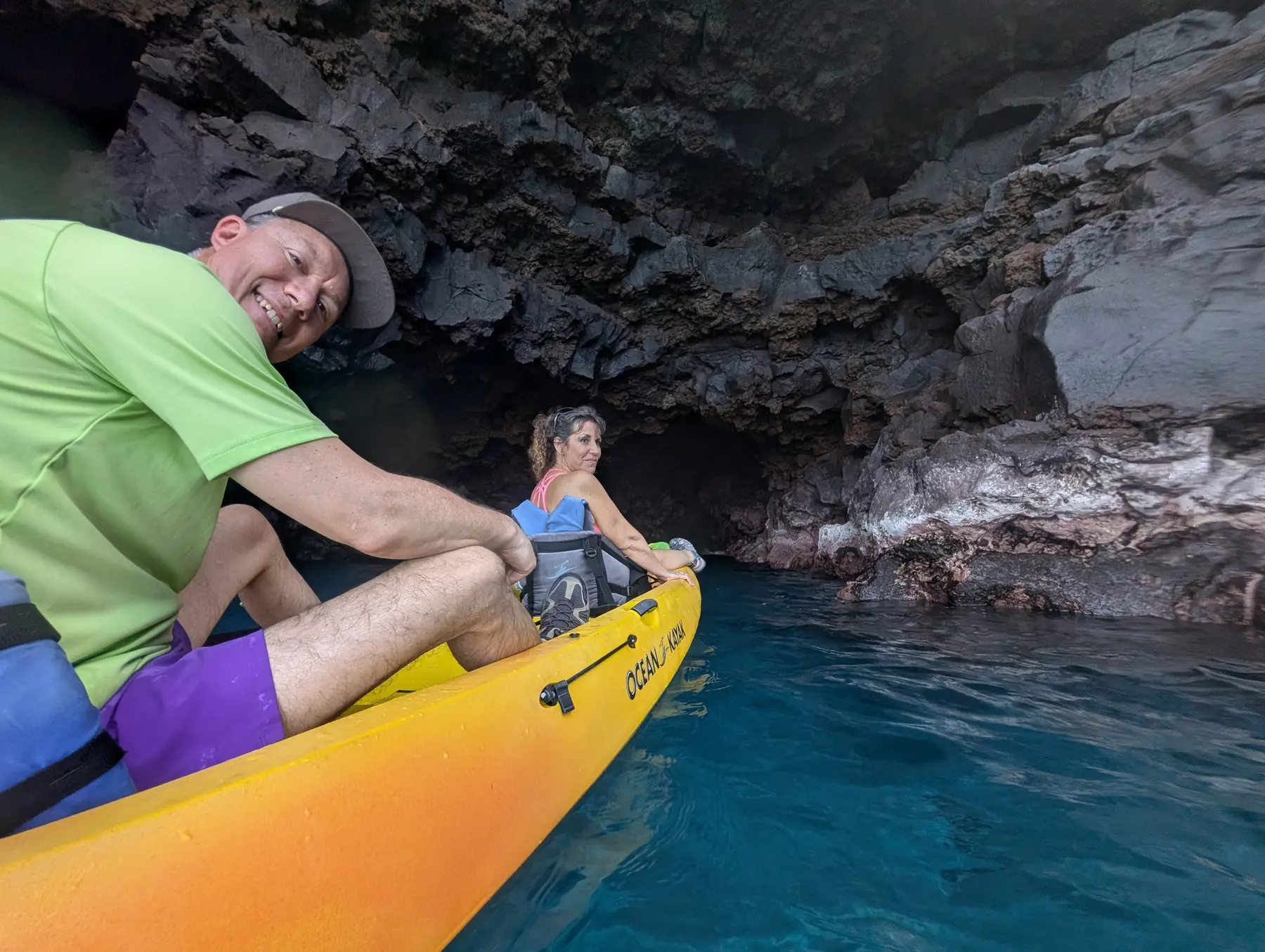 Ocean Safaris guests kayaking beside Kona's lava coastline
