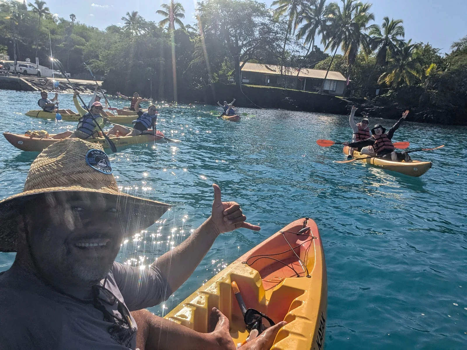 Winfield Brown in his kayak with a group at Keauhou Bay