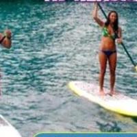 a man riding a surfboard in the water